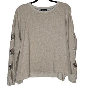 525 America cream colored top adorned with sequined stars. Size M